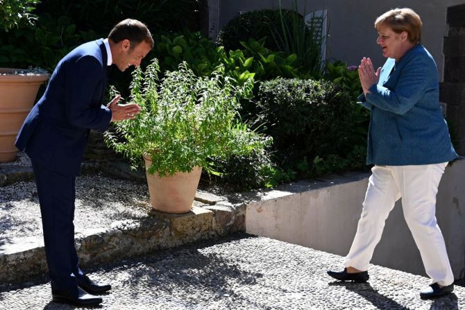 Emmanuel Macron Angela Merkel Greet Each Other With Namaste Video