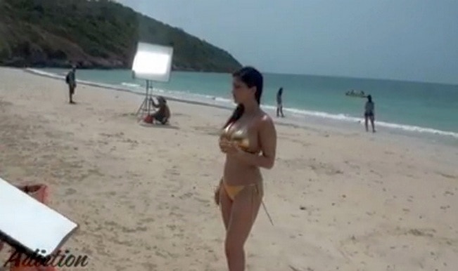 Baywatch: Sunny Leone's gold bikini shows off her sexy body on the beach for Adiction!