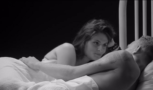 Strangers undress each other and get into bed in a sexy video India