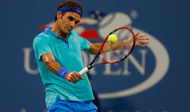 US Open 2014: Roger Federer seals fourth round berth as Gilles Simon ...