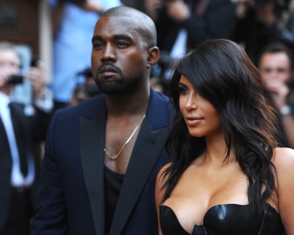 Kim Kardashian Shows Major Cleavage and Licks Kanye West's