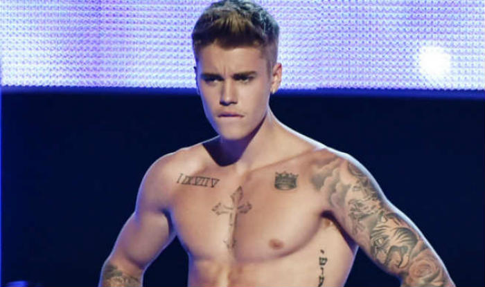 Justin Bieber Strips Down In New Photos India Com