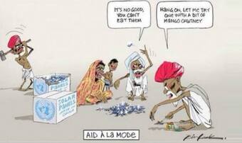 This 'racist' cartoon shows Indians eat solar panels in Australian daily; attracts strong criticism This 'racist' cartoon shows Indians eat solar panels in Australian daily; attracts strong criticism