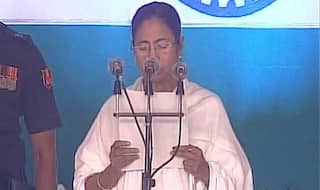 Mamata Banerjee and 42 ministers, including cricketer Laxmi Ratan Shukla, take oath in Kolkata