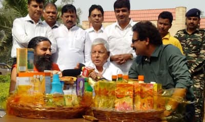 Baba Ramdev gifts Lalu Yadav a Patanjali hamper, RJD chief praises yoga  guru's success (Video)