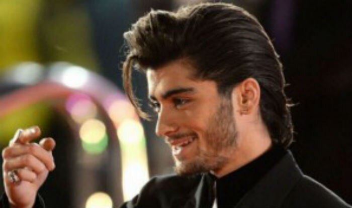 Zayn Malik insists his foot is 'fine' after it was run over by car in Paris  | The Australian