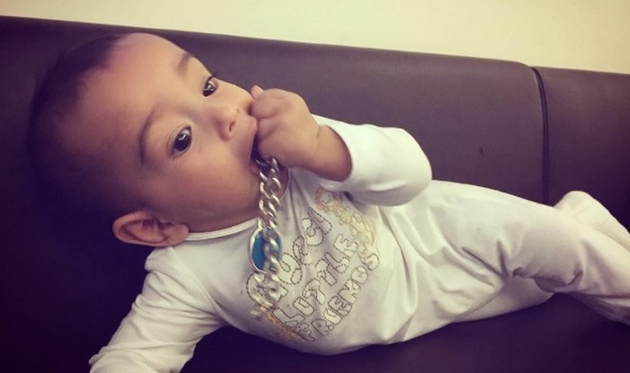 So cute! Salman Khan's nephew Ahil Sharma munches on his famous turquoise bracelet! (See pictures)