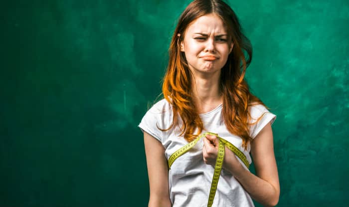 What causes breasts to stop growing?