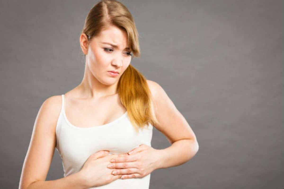 Premenstrual Breast Swelling And Tenderness: Causes, Symptoms And