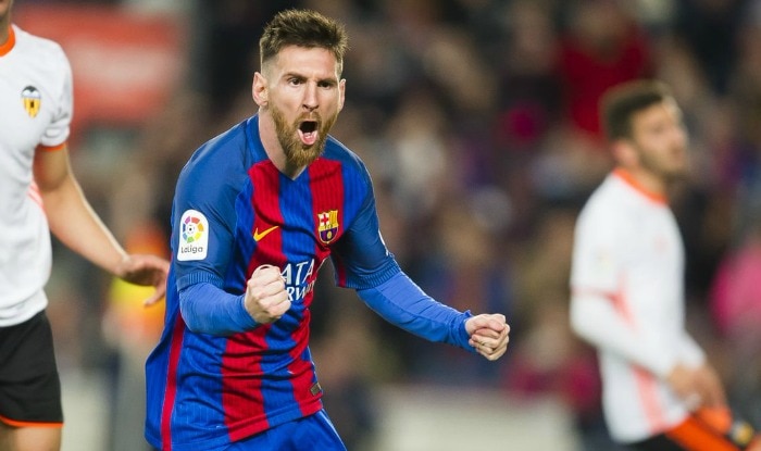 Messi scores three as 10-man Barca holds off Deportivo