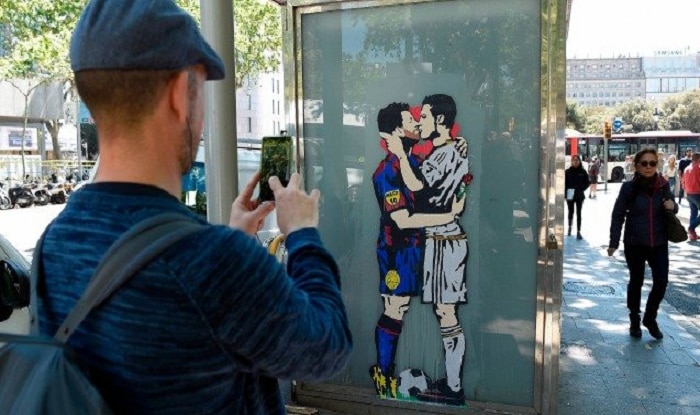 Lionel Messi, Cristiano Ronaldo kissing graffiti causes stir ahead of ...