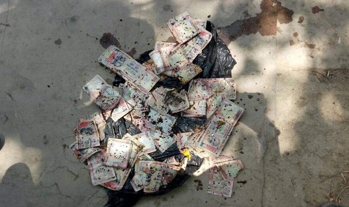 Demonitized Notes Rs 1,000 demonetised notes found dumped in a drain in Lucknow | India.com