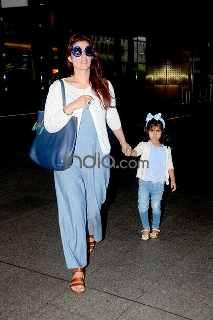 Aishwarya Rai sports fresh airport look as she holds Aaradhya's hand with  pride