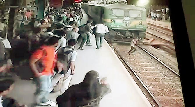  (But, she suddenly veers away and stands right in front of the train)
