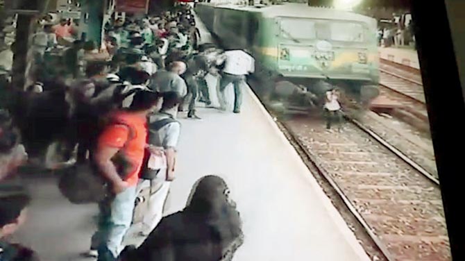  (The train hits her and knocks her over)