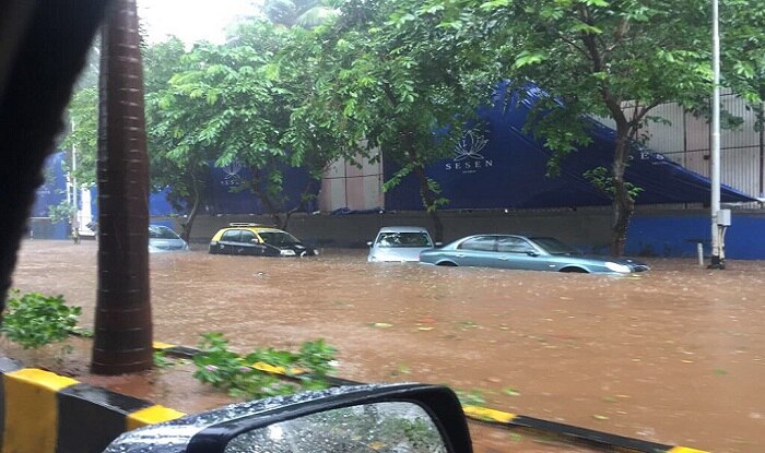 Mumbai Rains in Photos: Waterlogging at Many Places; Local Trains ...