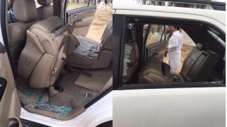 Congress vice president Rahul Gandhi’s car was attacked in Gujarat | गुजरातमध्ये राहुल गांधींच्या गाडीवर दगडफेक Congress vice president Rahul Gandhi’s car was attacked in Gujarat | गुजरातमध्ये राहुल गांधींच्या गाडीवर दगडफेक