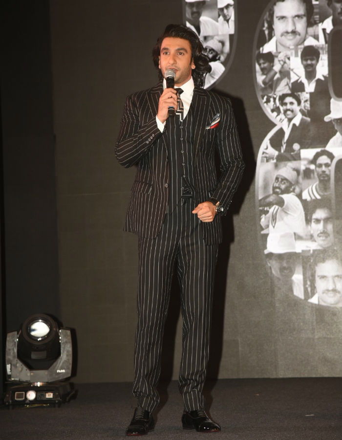 Ranveer Singh Arrives At Kapil Dev Biopic Launch in Dapper Pinstripe Suit!  5 Other Times Ranveer Suited Up in Style!