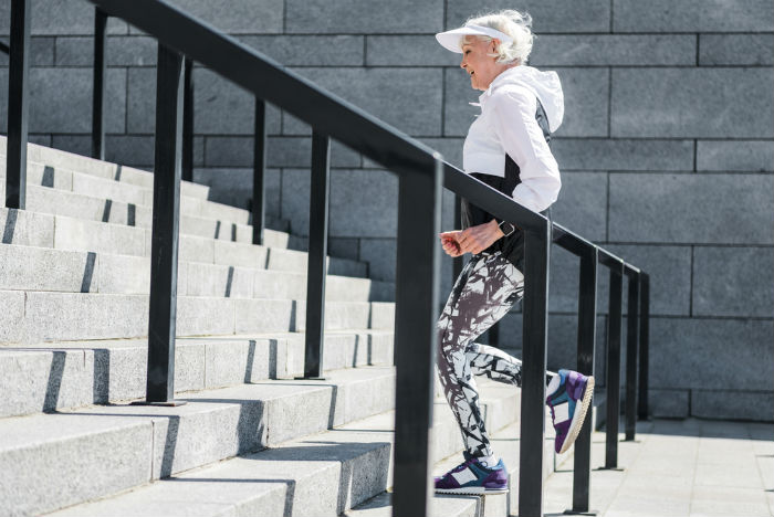 Woman climbing stairs