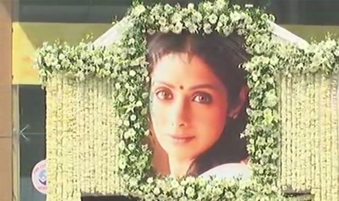 Sridevi was taken on her final journey on a truck decorated with flowers and a life size picture of her