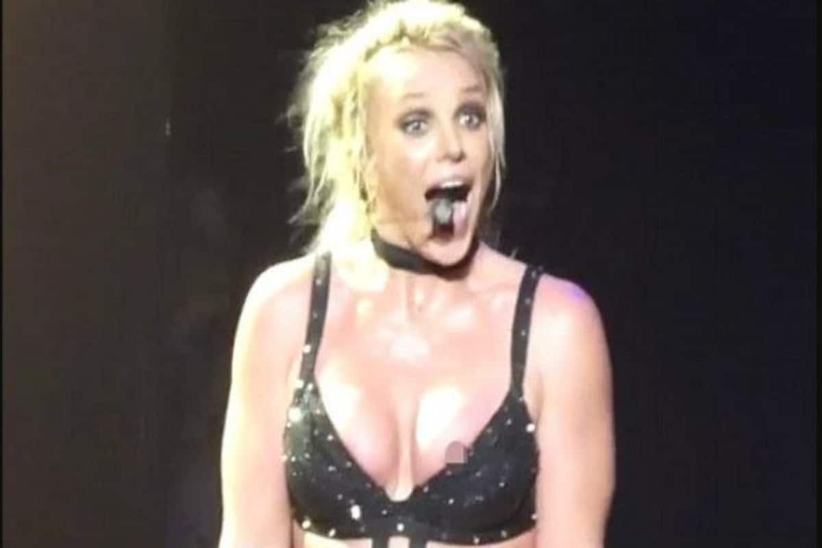 Access Hollywood on X: Oops! Britney Spears had an accidental nip slip  during her #PieceOfMe tour & she didn't even Do Somethin' about it.    / X