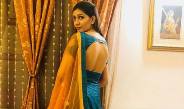 Haryanvi Sensation Sapna Choudhary Looks Sexy in Blue Backless Lehenga