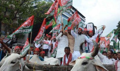 SP workers stage a demonstration during a nationwide shutdown protest or 'Bharat Bandh' against rising fuel prices called by opposition parties led by Congress, in Patna