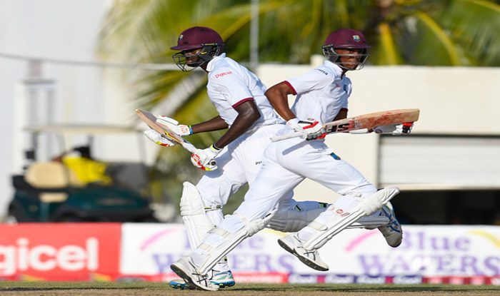 India Vs West Indies 2018 2nd Test Roston Chase Jason Holder Slam Fifties As Windies Score 295 7 Against India On Day 1 India Com