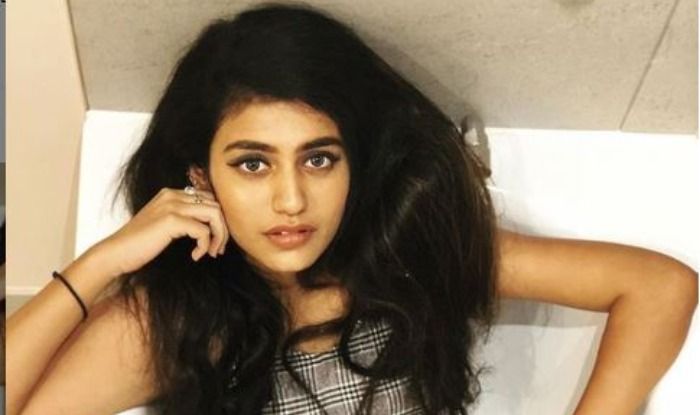 Internet Wink Queen Priya Prakash Varrier Looks Super Hot as She Poses Seductively on Bed – See Pictures
