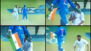 India vs New Zealand 3rd T20I: MS Dhoni Acquires God-Like Status After Fan Carrying National Flag Halts Match to Touch His Feet in Hamilton | WATCH VIDEO India vs New Zealand 3rd T20I: MS Dhoni Acquires God-Like Status After Fan Carrying National Flag Halts Match to Touch His Feet in Hamilton | WATCH VIDEO