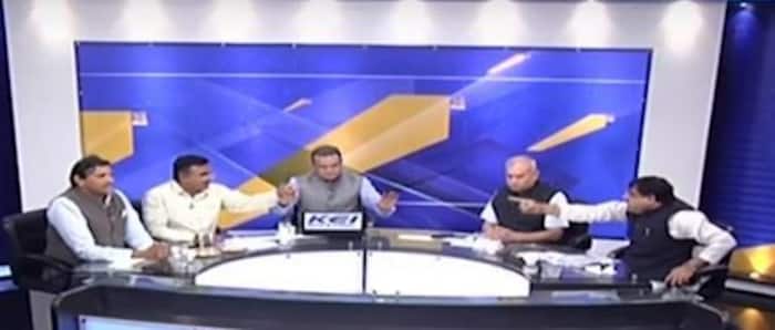Congress Leader Throws Water At Bjp Leader On Live Tv Debate After Being Called Traitor 0360