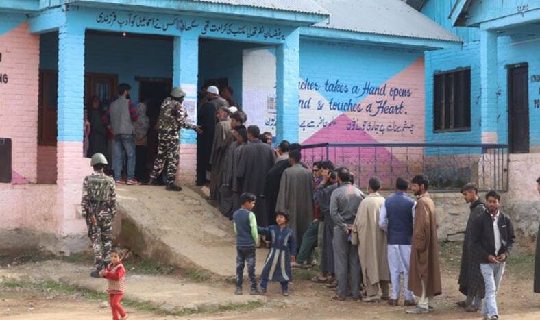 People at a polling booth in Kupwara
