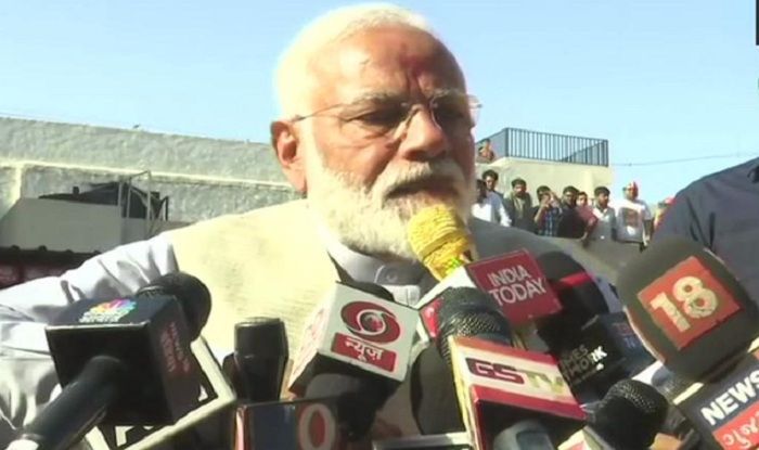 PM Modi Seeks Mother's Blessing Before Casting Vote in Ahmedabad's Ranip PM Modi Seeks Mother’s Blessing Before Casting Vote in Ahmedabad’s Ranip
