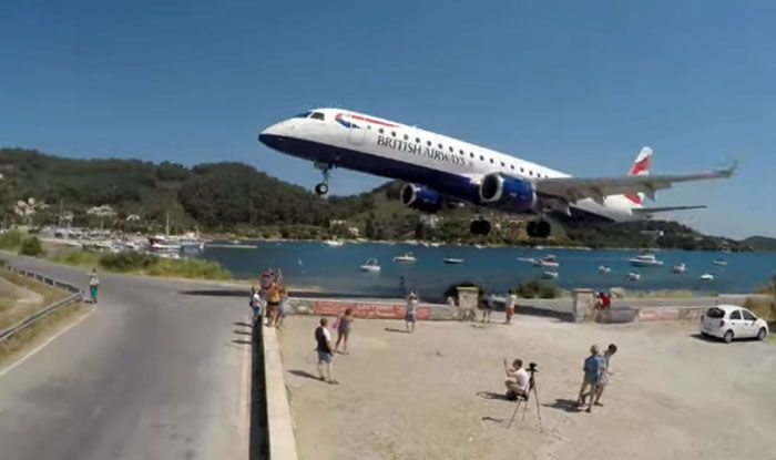 Viral Video: Airplane Lands Just a Few Feet Away From Tourist Plane makes landing a few feet away from tourists