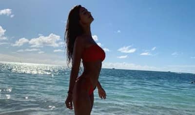 Disha Patani Sexy Red Bikini, Strikes Sulty Pose Midst of Beach on Instagram