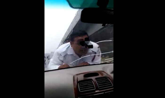 Viral Video Shows Delhi Traffic Cop Being Dragged On Car Bonnet Watch