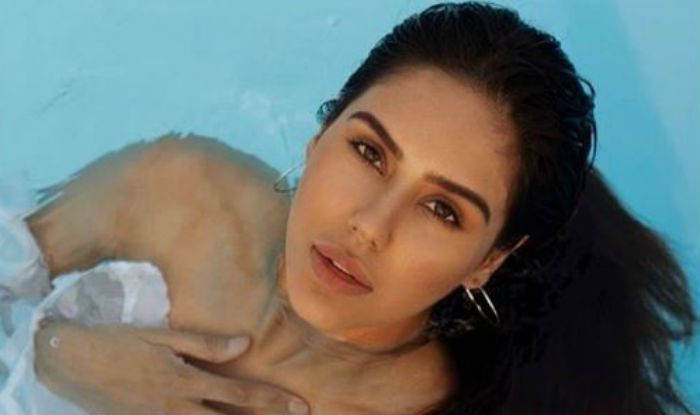 Punjabi Hotshot Sonam Bajwa Looks Scorching Hot In White Bikini As She Takes A Dip In The Pool 1285