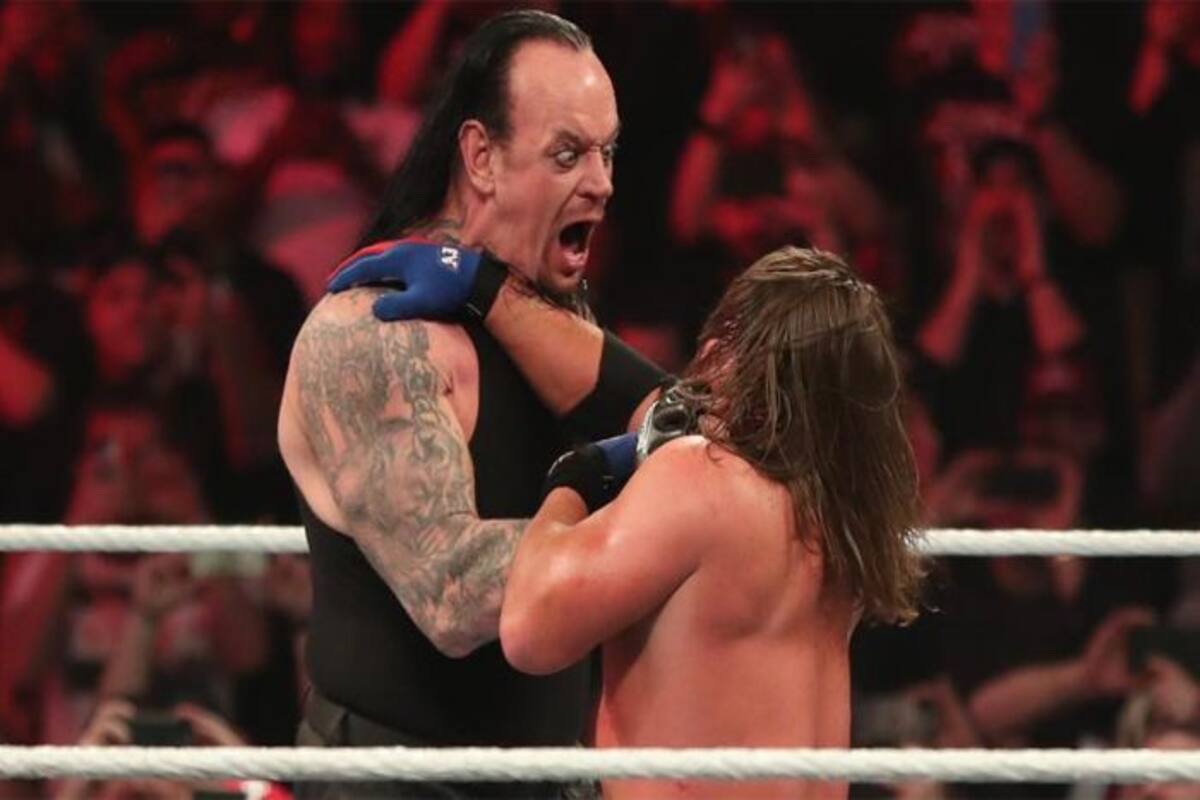 WWE Elimination Chamber Results: Undertaker Chokeslams Styles ...