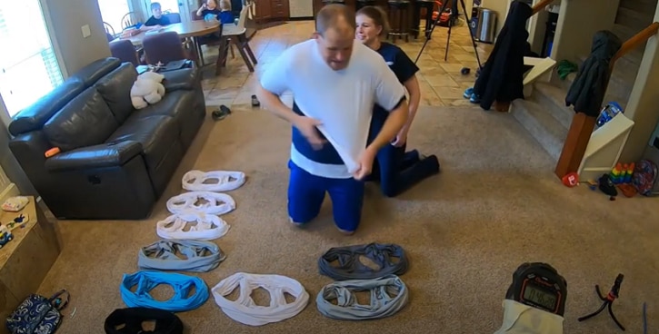 Woman Dresses Husband in 32 T-Shirts in One Minute to Break Guinness World Record | Watch the Crazy Video