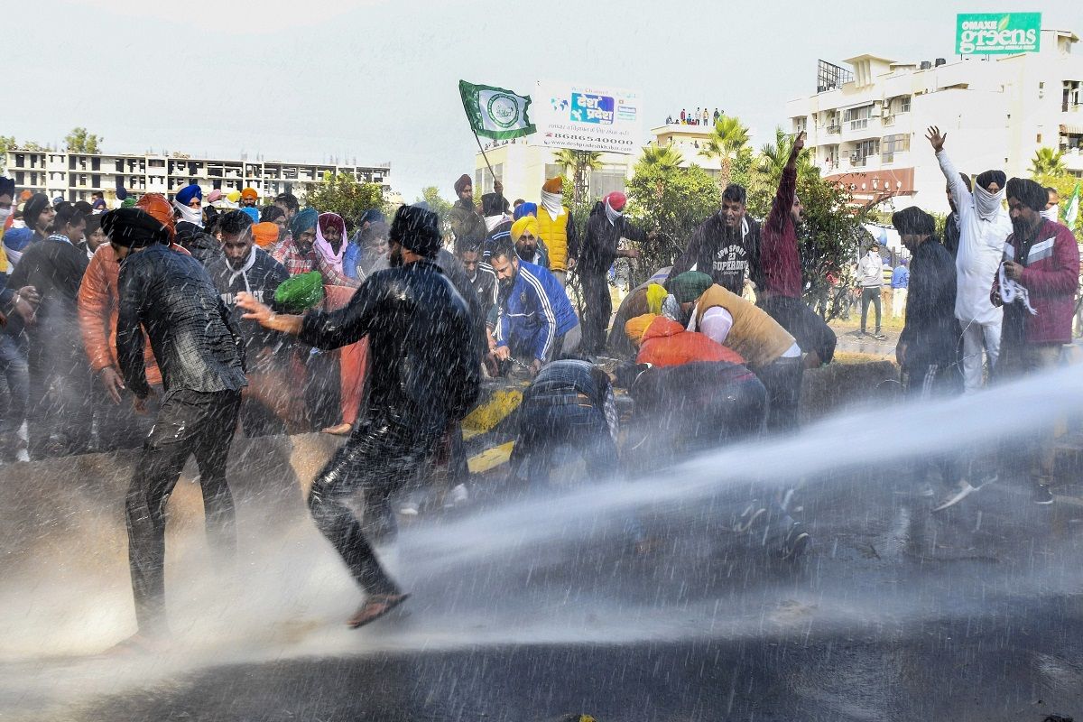 Delhi Chalo: Defying Barricades, Water Cannons, Farmers Push Through ...