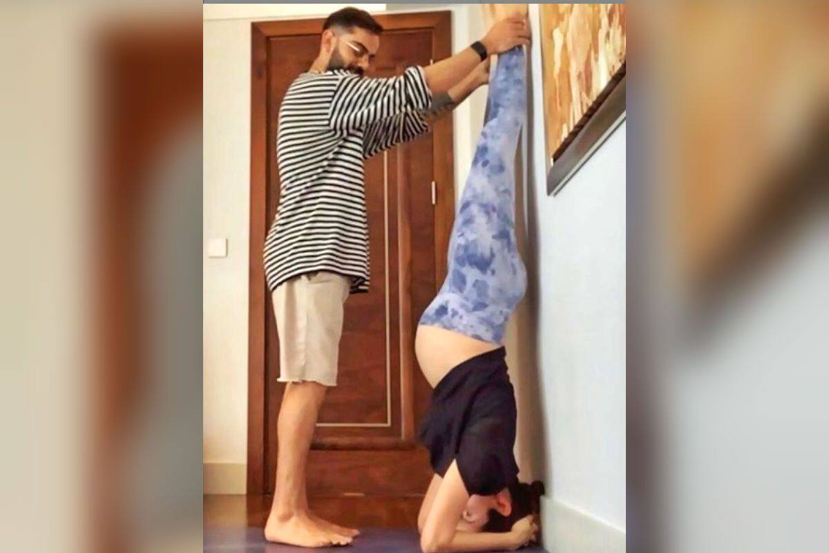 Pregnant Anushka Sharma Does A Headstand With Virat Kohli S Help Should You Try Such Yoga Postures During Pregnancy Here S What We Know India Com