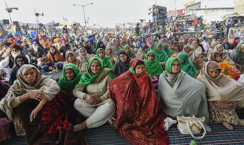 Women farmers during their ongoing protest against new farm laws, at Singhu border in New Delhi, Thursday, Dec 31, 2020. (PTI Photo)