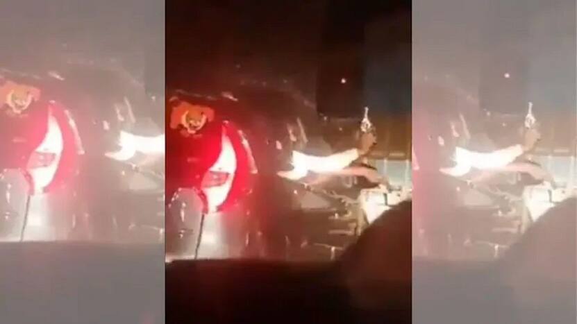 Video shows the car with Shiv Sena logo brandishing a gun. (Photo: Screengrab)