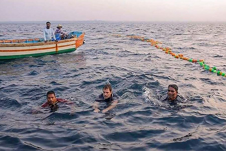 Rahul Gandhi swims with fishermen in Kollam.