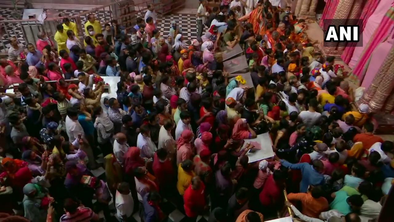 Devotees gather at Banke Bihari Temple in Vrindavan, on the occasion of Holi