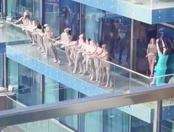 Footage shows more than a dozen women on the balcony