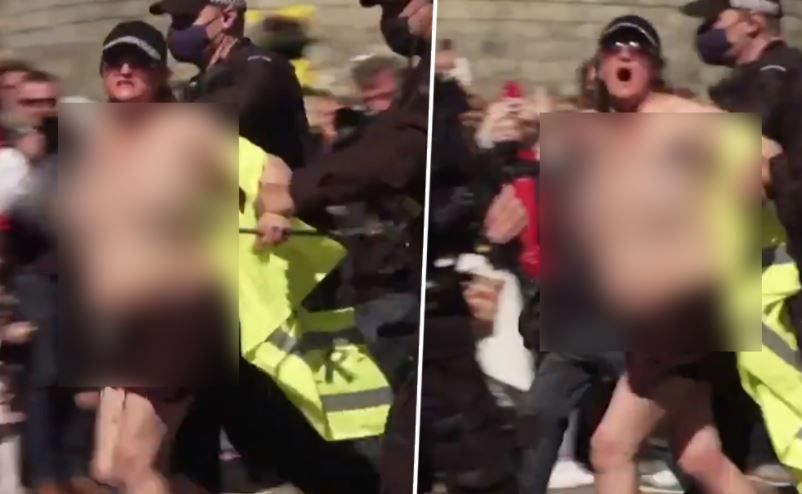 Topless Woman Who Shouted 'Save The Planet' During Prince Philip's Royal Funeral Arrested