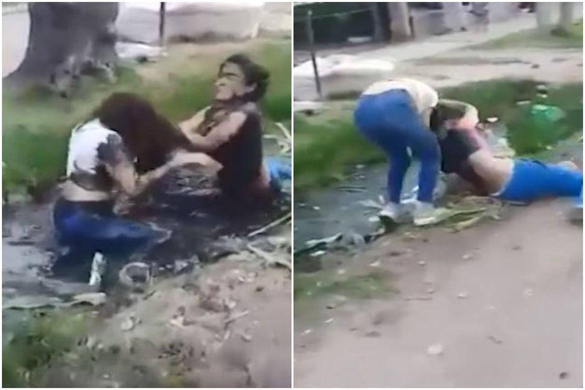 Viral Video 2 Girls Fight Violently in Middle of The Road, Push Each Other Into Dirty Drain Watch