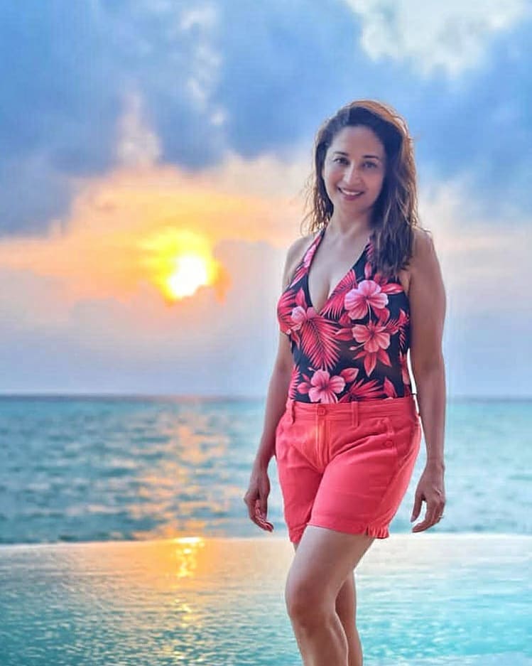 Madhuri Dixit in Red shot and printed top