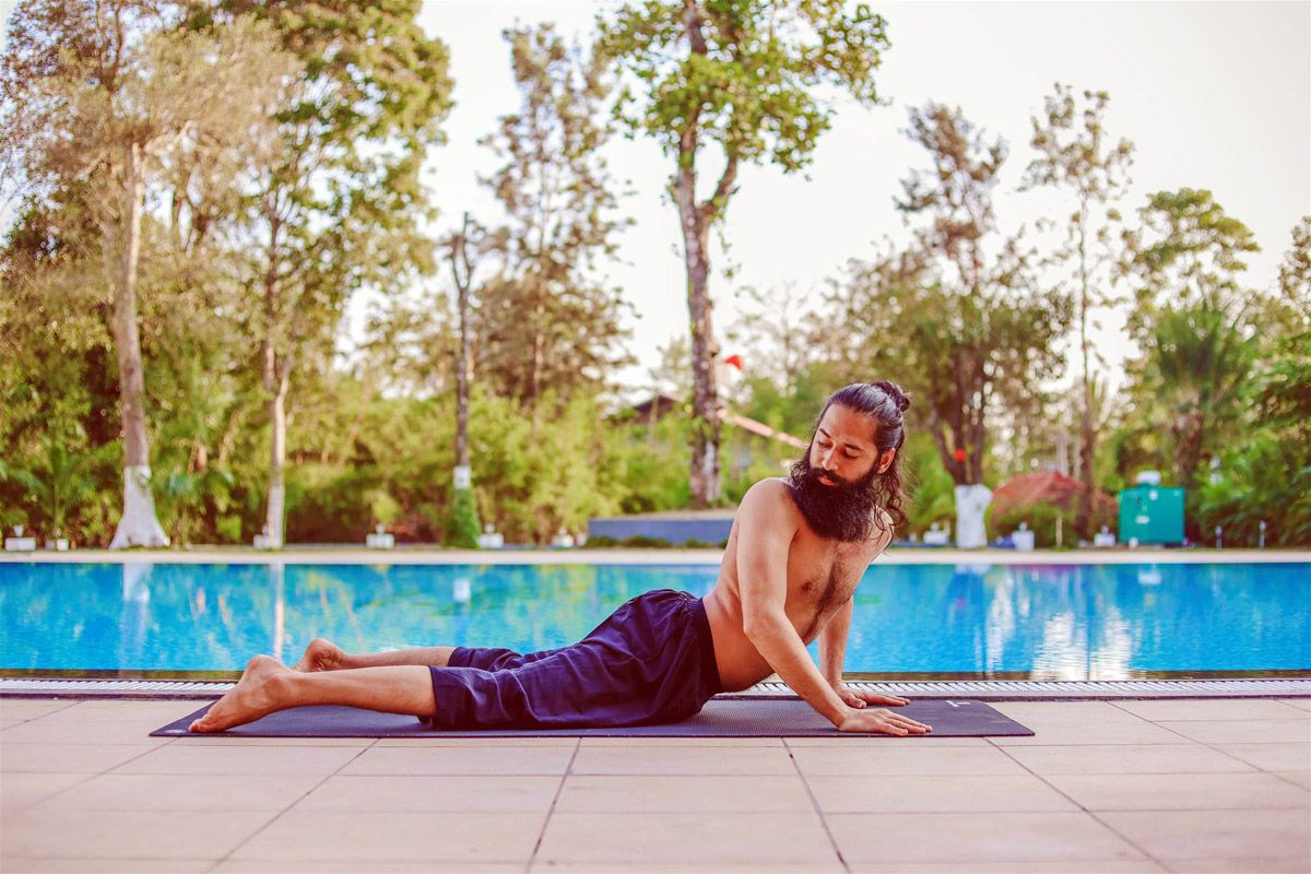 Twisted Cobra Pose (Triyaka Bhujangasana)